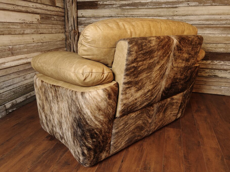 Back view of the Texas Longhorn Recliner highlighting the medium exotic brindle cowhide covering and the sleek design.