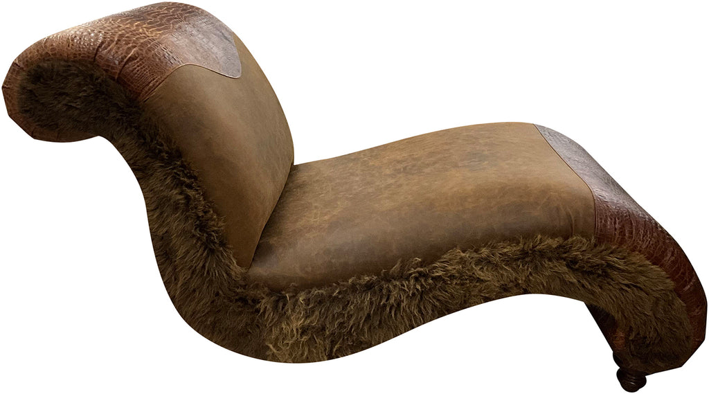 Embossed top grain dark brown leather are on the head and foot, rustic cognac leather in the center with genuine buffalo hide along each side of the lounge chair