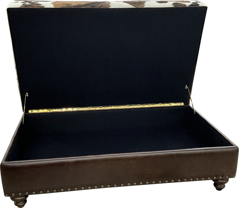 The Highlands Storage Ottoman with the top cushion lifted, revealing the spacious storage compartment inside.