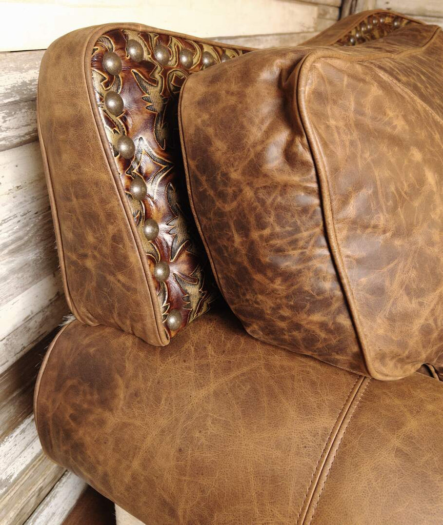 A close-up of the plush seat cushions, revealing the rich texture of the leather, smooth upholstery, and luxurious padding for ultimate relaxation.