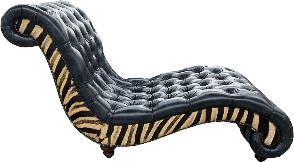 Black tufted chaise lounger with genuine zebra hide on each side of chair plus nailhead trim