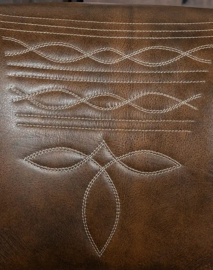 Western-style barstool with a boot stitch design on the leather backrest, adding a heritage touch.