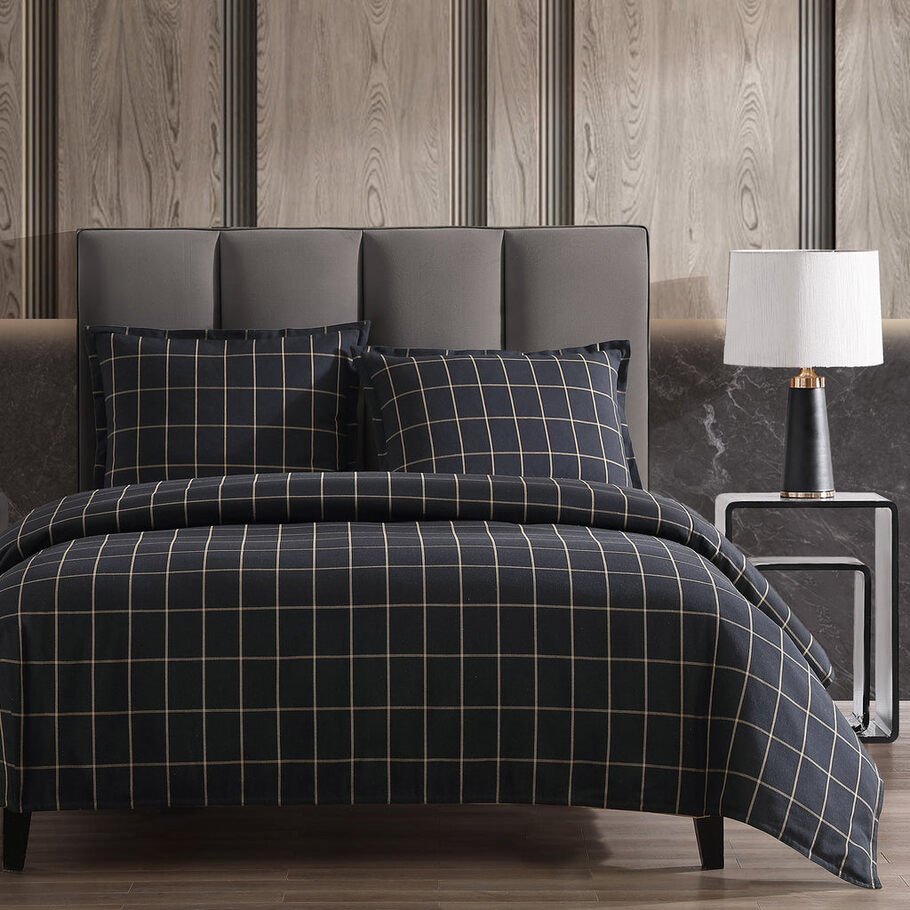 Windowpane Plaid Black Lodge Comforter Set styled in a modern bedroom setting, complemented by wooden accents and cozy decor elements.