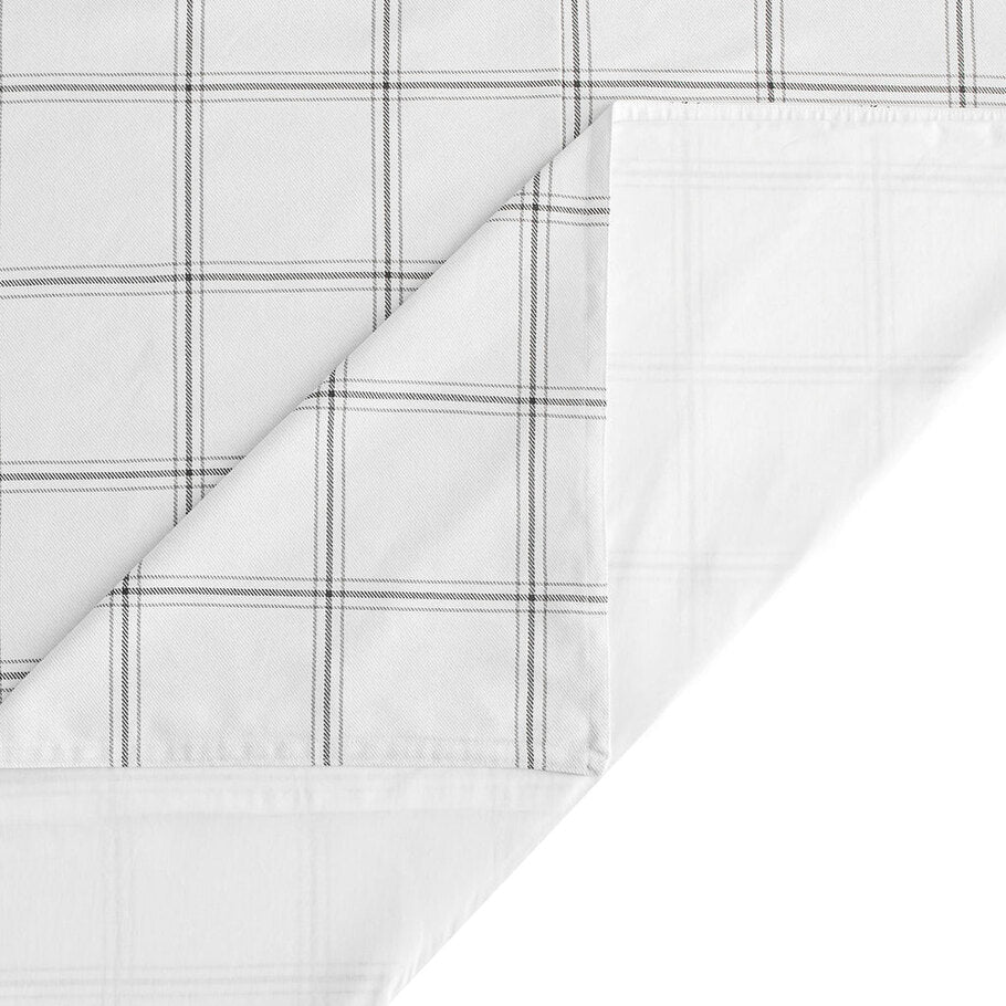 Close-up of the comforter's corner, displaying precise stitching reflecting quality craftsmanship.