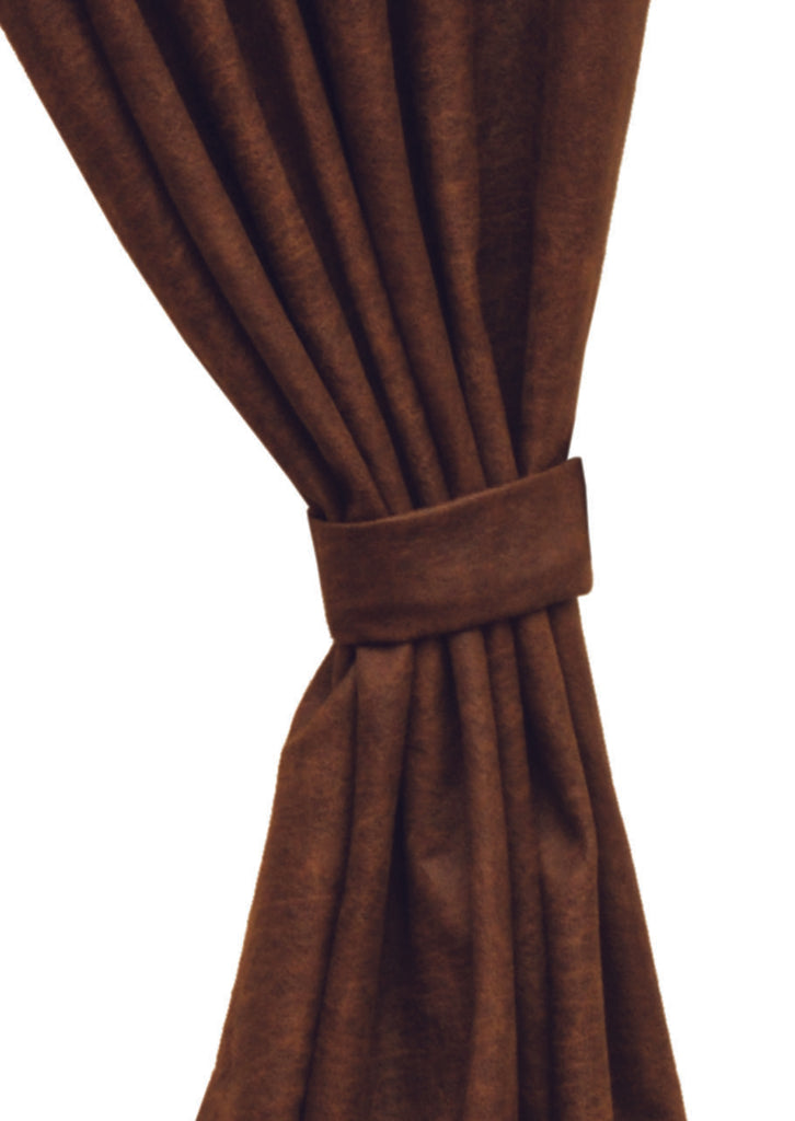 Kinsale Oxford single drape tie-back in distressed Faux Leather Bourbon with grommet closure, featuring a warm rustic brown tone and aged leather texture.