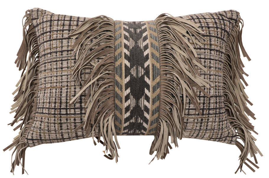 Rustic accent pillow featuring a muted brown and gray plaid pattern with a bold central spearhead motif, genuine taupe leather accents, and cascading fringe along the sides. Made with a 100% polyester pillow form and a cover crafted from 91% polypropylene and 9% polyester. Coordinates with the Spearhead Dusk bedding collection by Wooded River.
