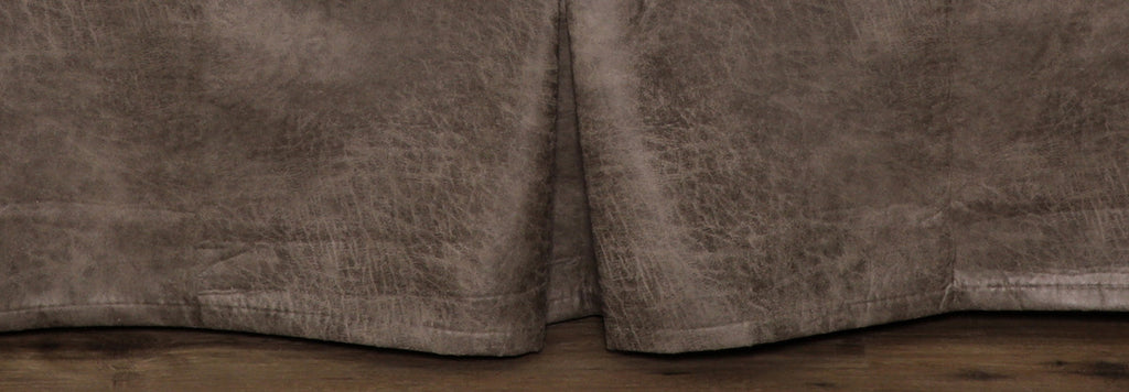 Spearhead Dusk Bedskirt in faux leather Shale finish, featuring soft grey tones and a pleated design with a 15-inch drop, styled on a bed with matching Spearhead Dusk bedding by Wooded River.