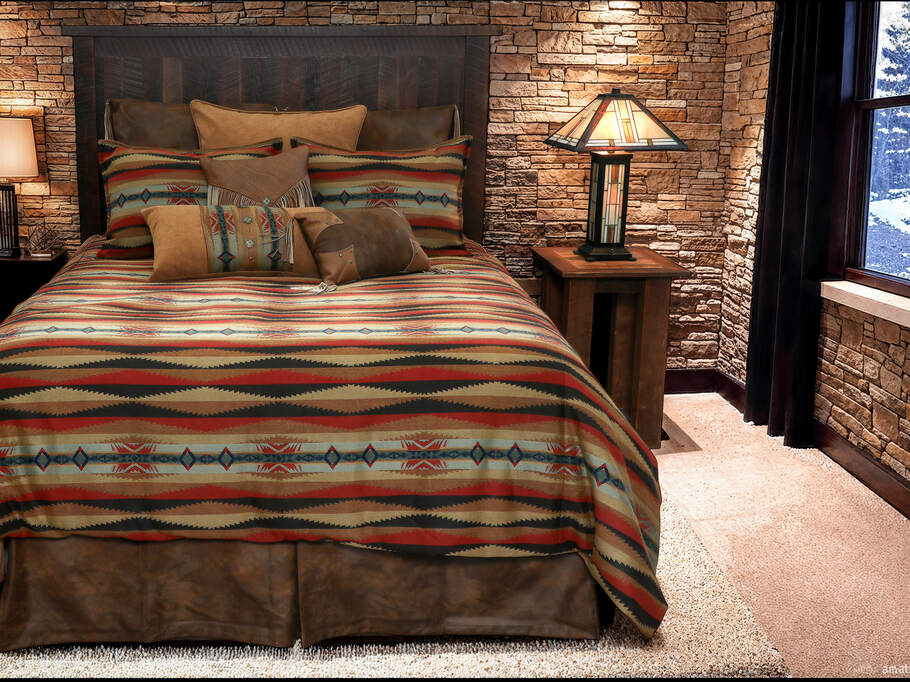 Wooded River Sunset Canyon Bedding Set displayed on a bed, featuring a serene blend of sage green, rust, brown, and soft blue tones. The set includes a bed cover, two standard shams, two tasseled Euro shams, and one alternate Euro sham, all adorned with Southwest-inspired geometric patterns. The duvet is made from durable 100% Sunbrella Acrylic with a soft polyester reverse, and the design evokes desert landscapes with rustic elegance.